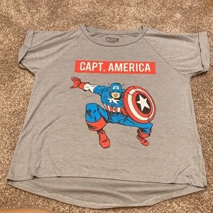 Woman, graphic shirt Captain America.